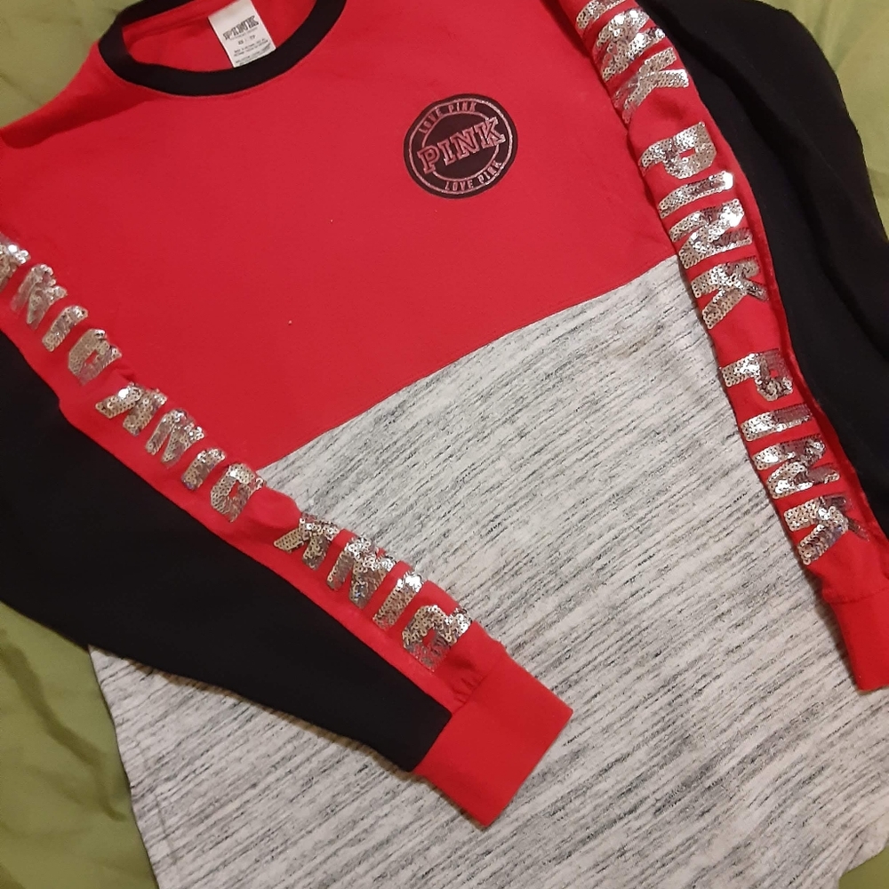 Pink long sleeve shirt.
